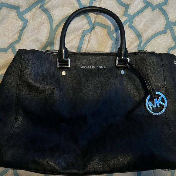 Purchased from Michael Kors Outlet. Black with grey MK and inside pockets - Picture 1 of 4